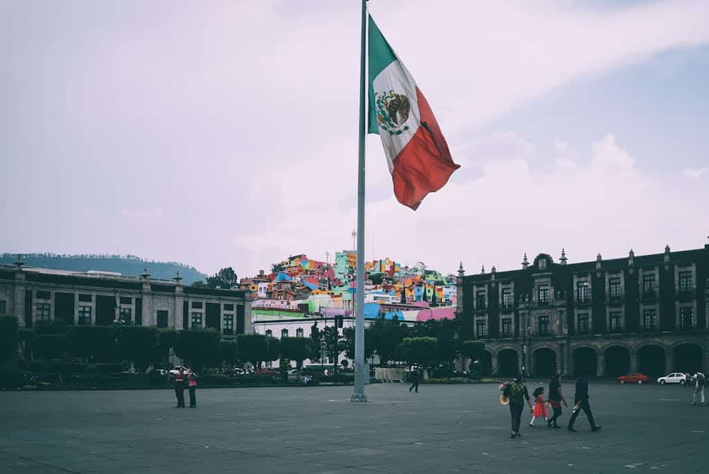 People Near Mexican Flag in Mexico City