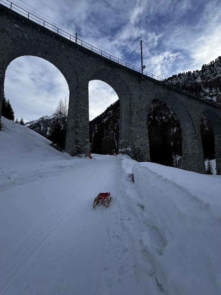 Sledding in Preda a few train stops away from St. Moritz